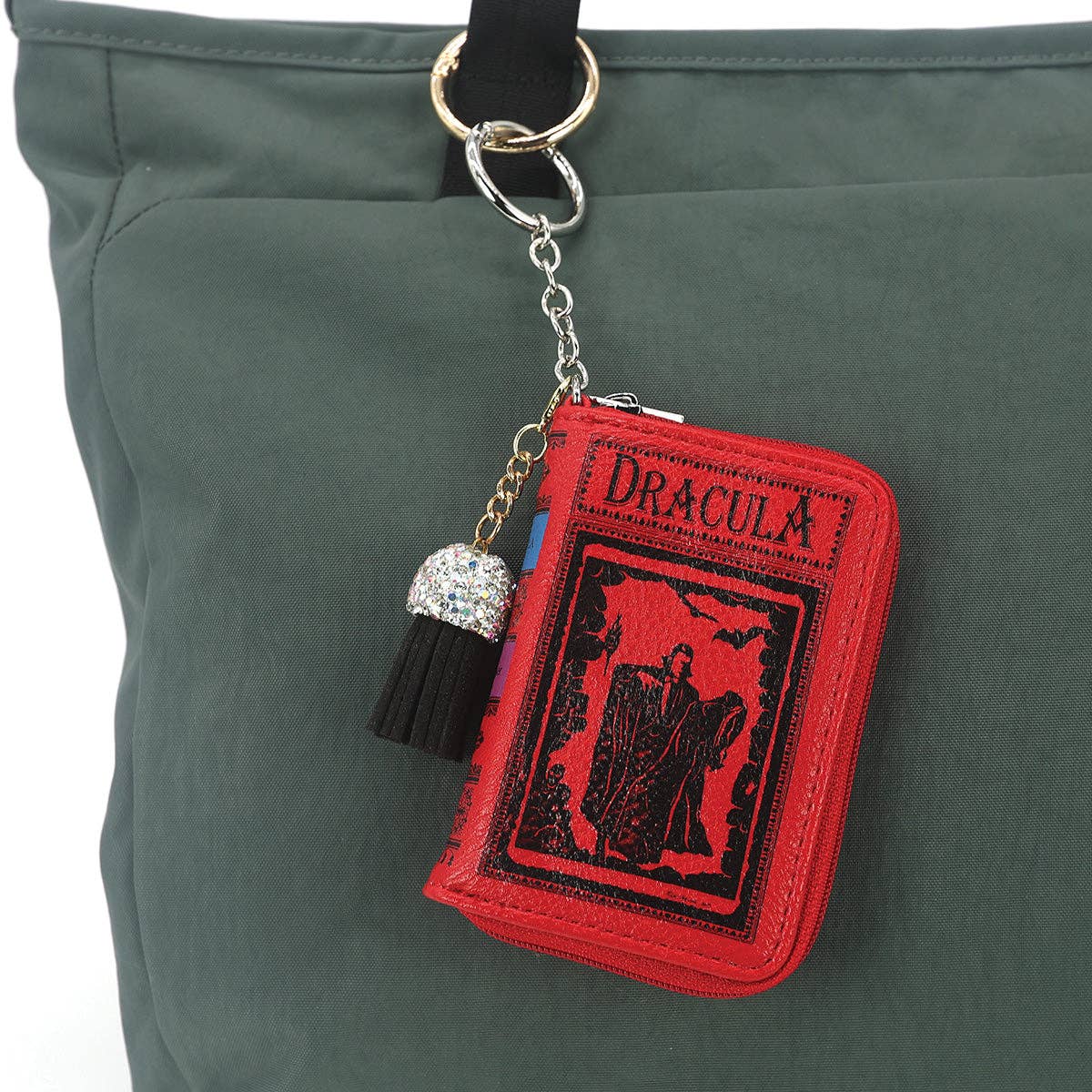 Keychain shaped like a book titled &