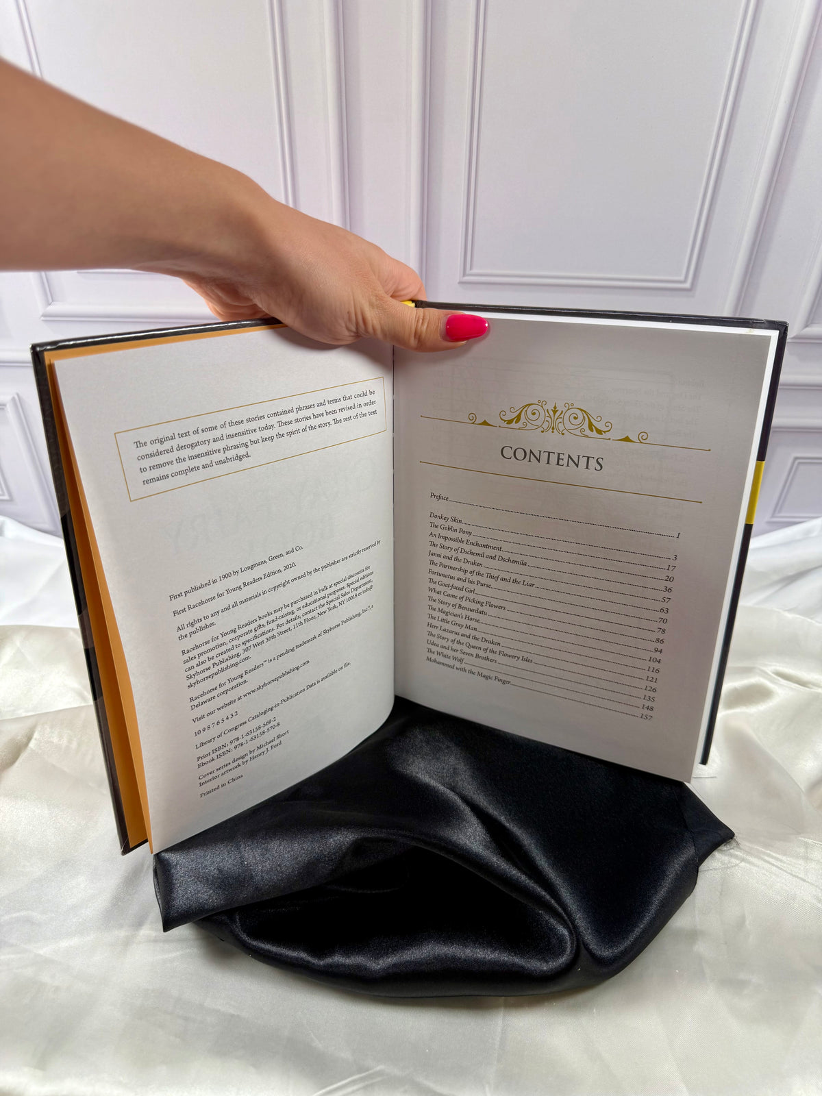 The Gray Fairy Book by Andrew Lang opened to its table of contents, featuring a selection of traditional fairy tales.