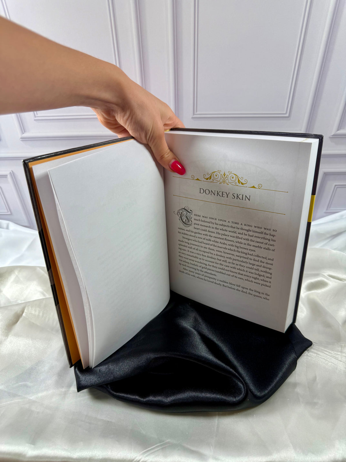 Interior story pages of The Gray Fairy Book by Andrew Lang, showing a traditional fairy tale with decorative typography.
