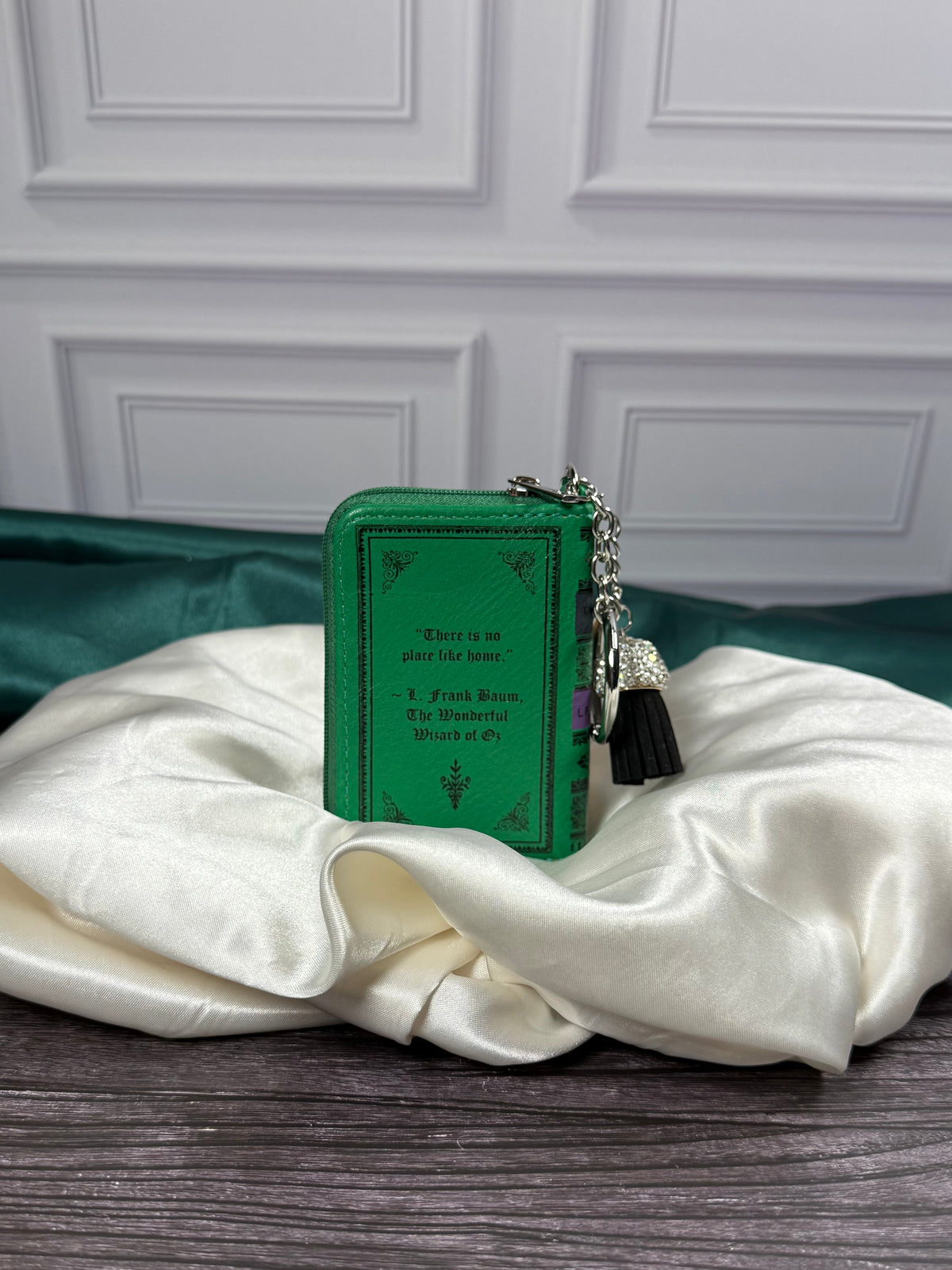 Back of The Wizard of Oz miniature book bag charm featuring the quotation There&