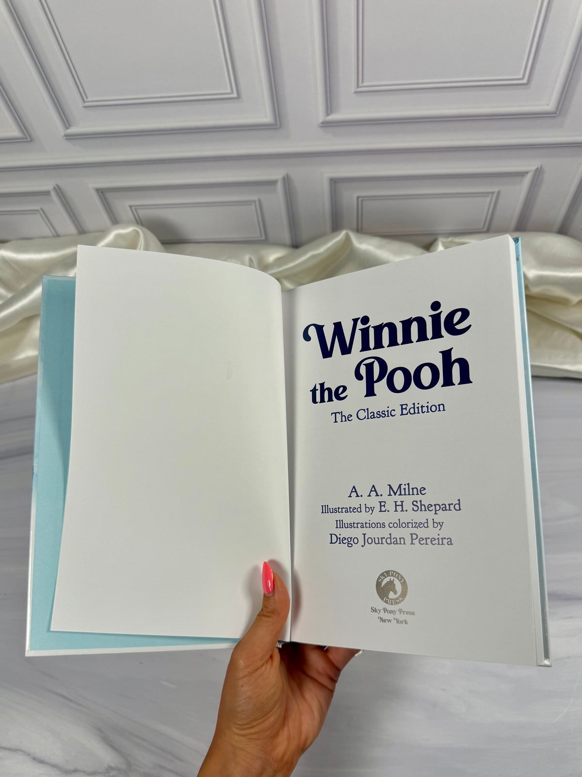 Title interior pages of Winnie-the-Pooh by A. A. Milne showing classic children&