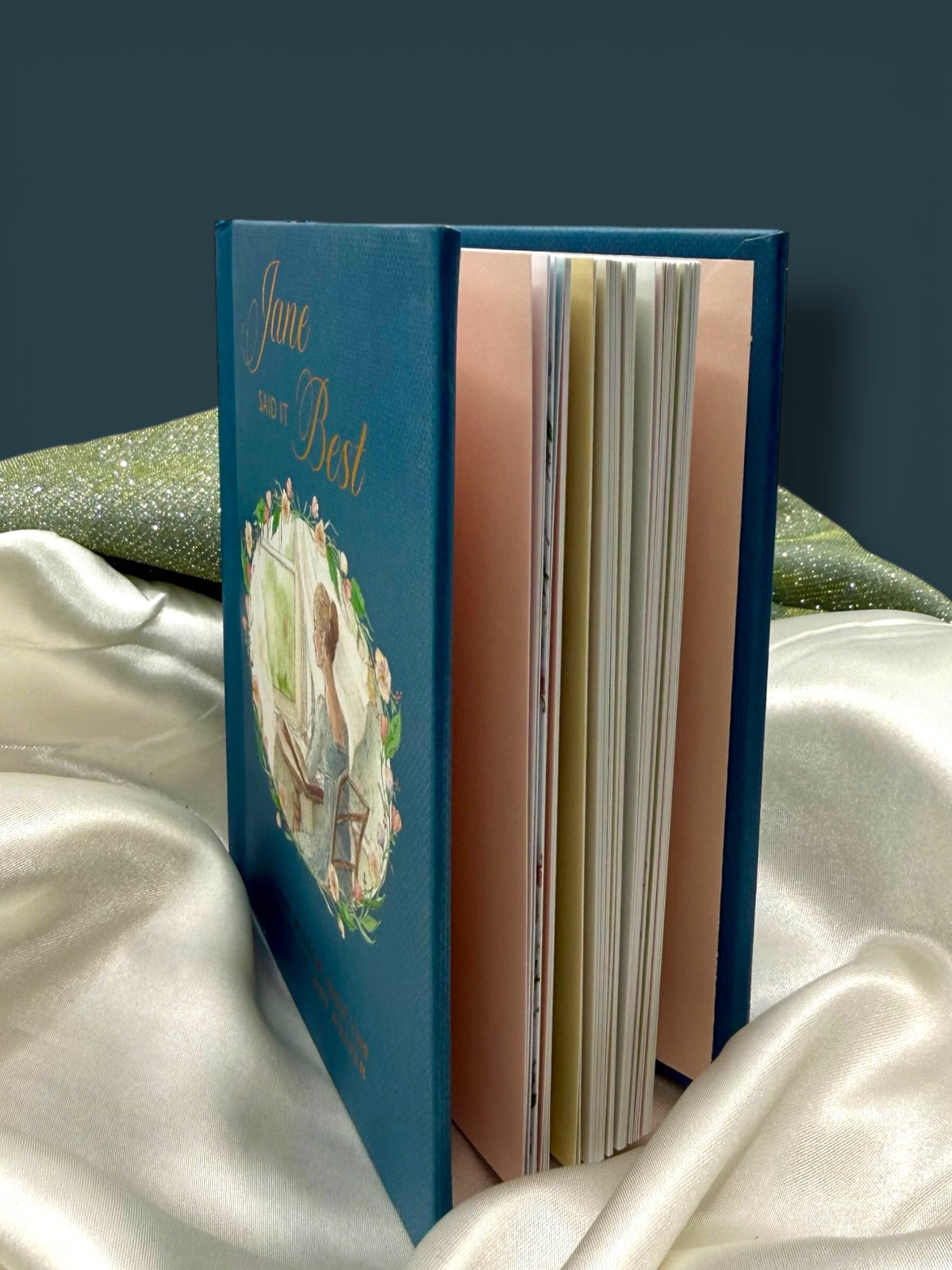 Side view of Jane Said It Best, a compact illustrated Jane Austen quotation book measuring 5.5 × 4.7 inches, a charming literary gift for Austen readers.