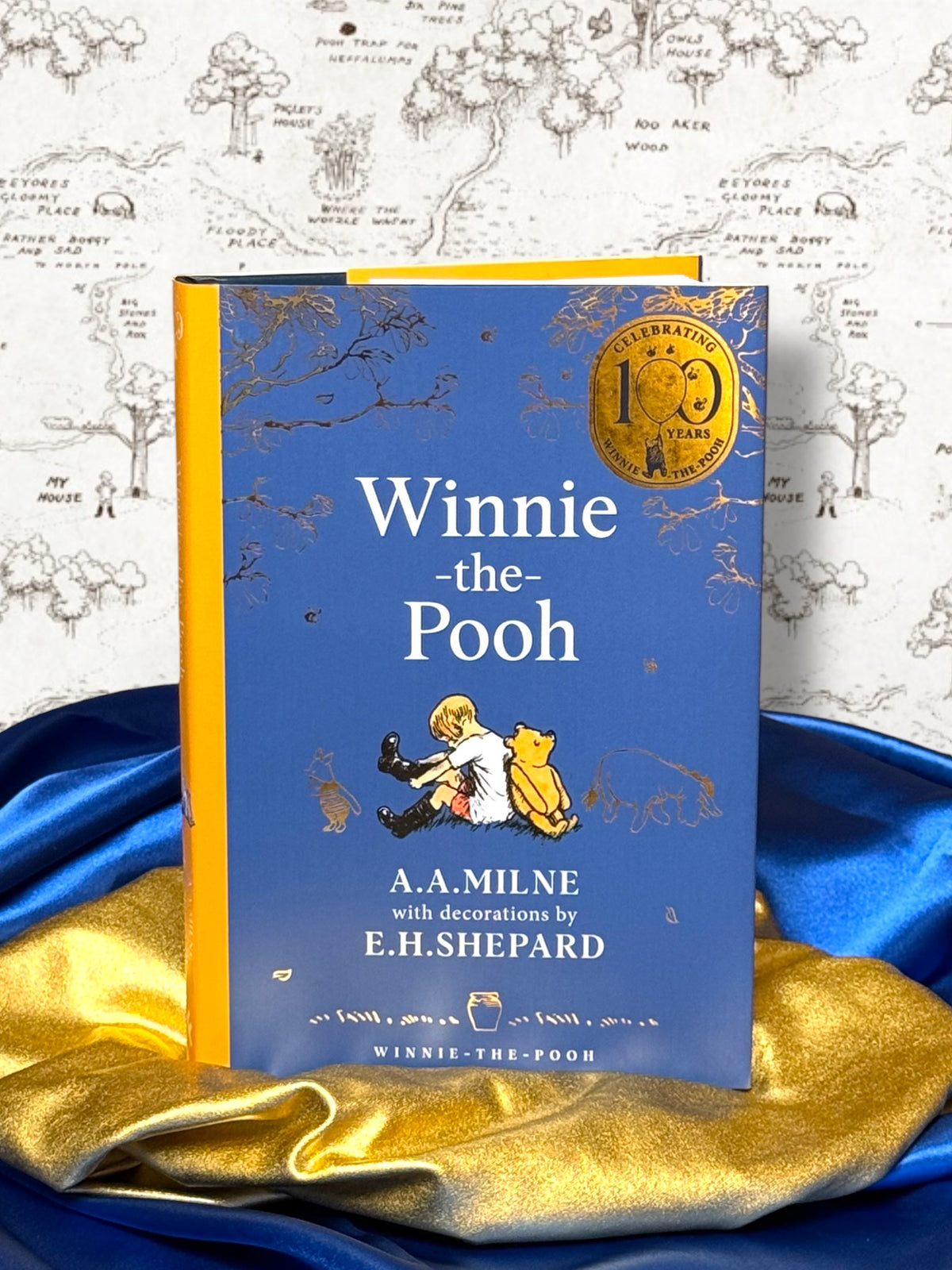 Winnie-the-Pooh by A. A. Milne 100th anniversary illustrated hardcover with blue dust jacket and gold anniversary emblem