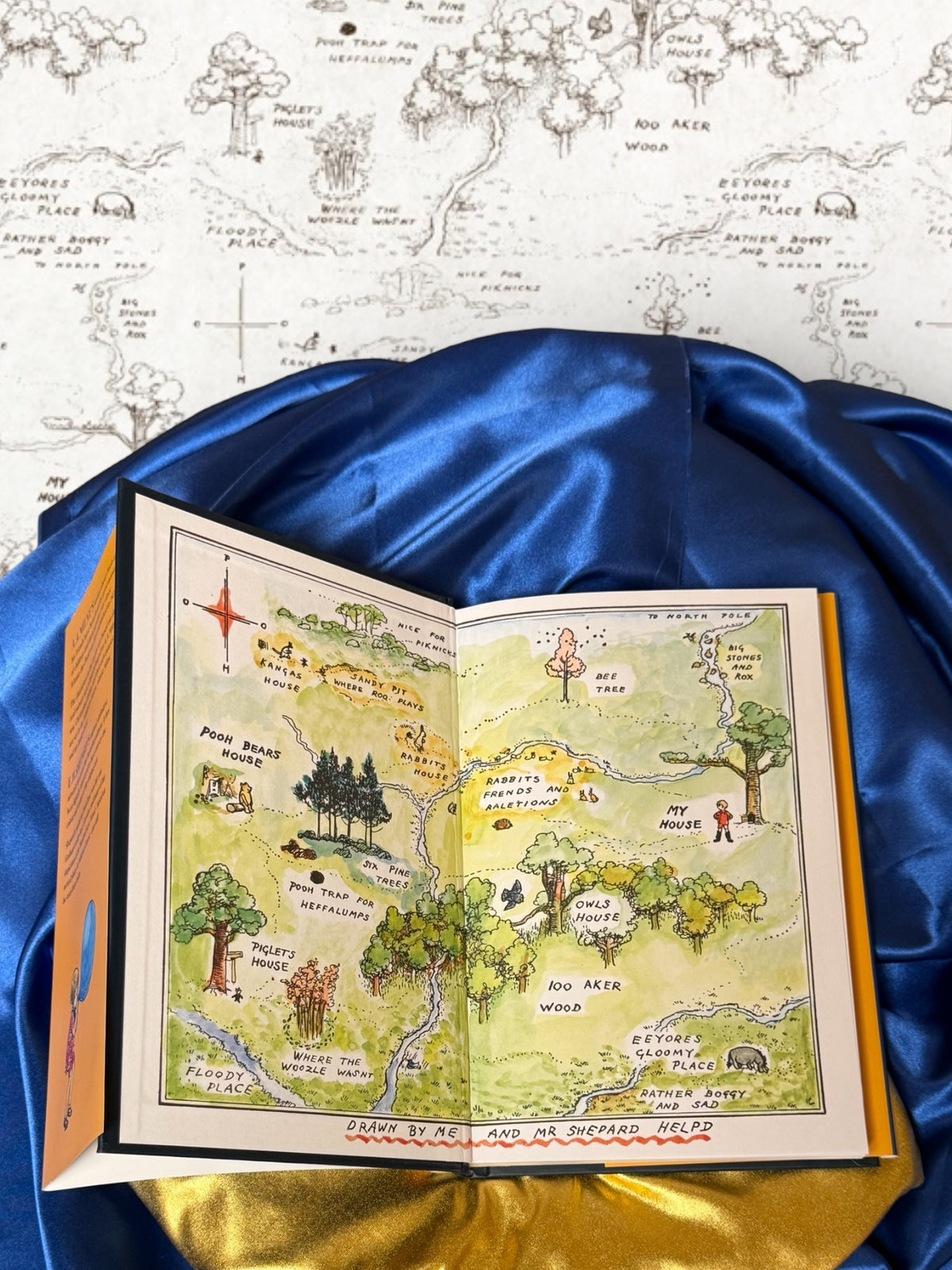 Winnie-the-Pooh hardcover opened to E. H. Shepard&