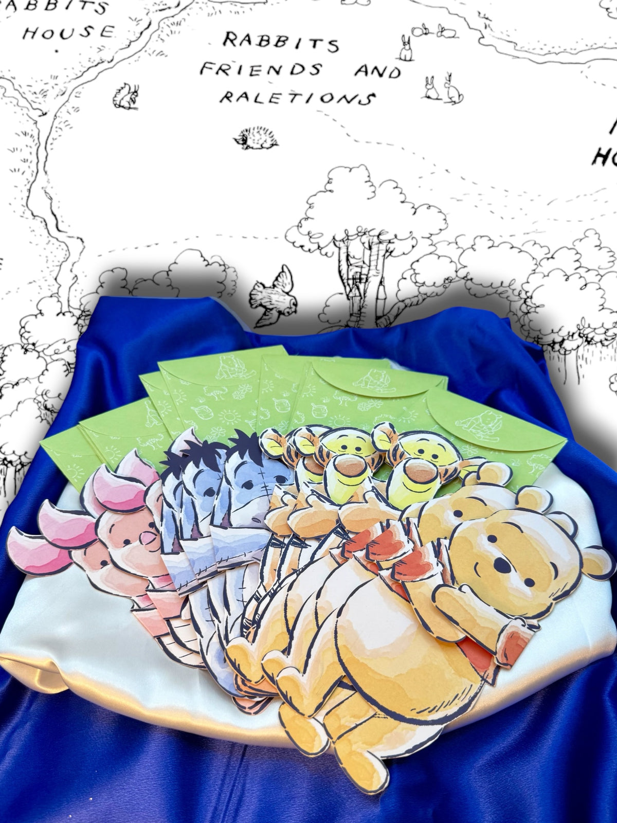 Disney Winnie the Pooh Hugs character cards and coordinating envelopes arranged together in a StoryGiftStudio display.