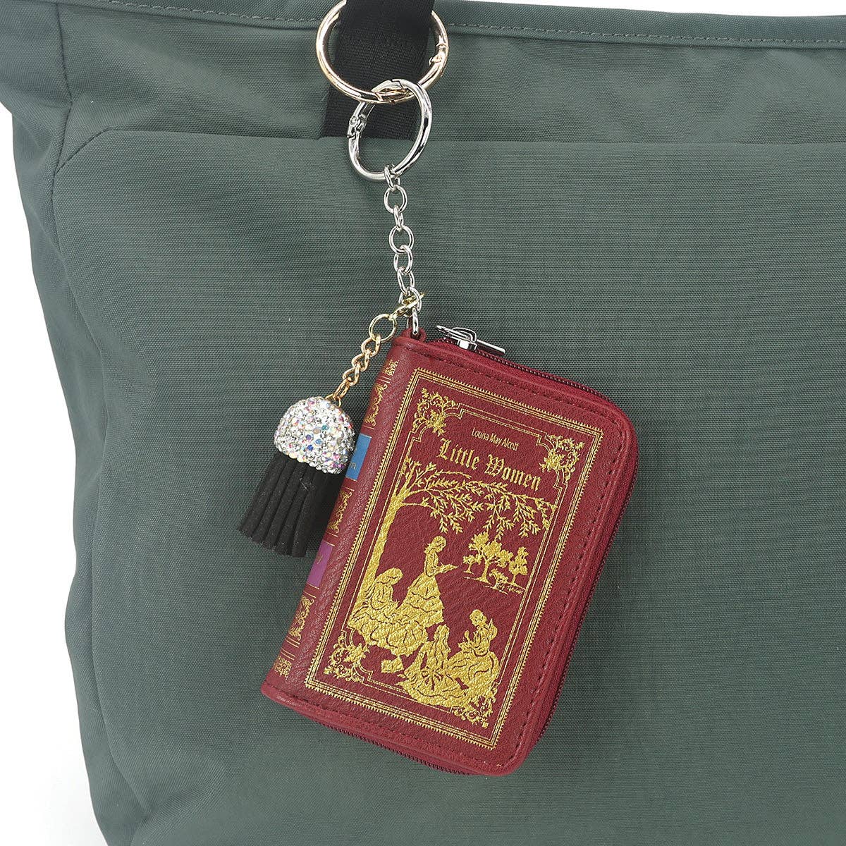 Keychain shaped like a book titled &