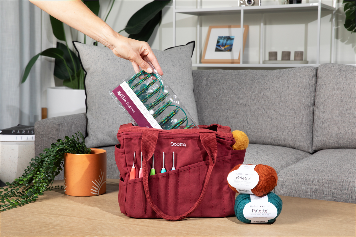 Sangria Soolla Studio Bag holding colorful art and craft supplies.