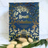 Collection of Charlotte Bronté books with a decorative box on a white background