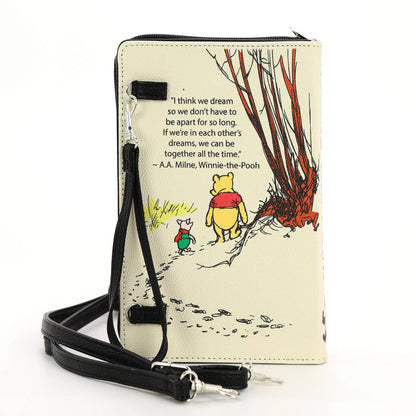 Back and spine of The House at Pooh Corner beige Winnie-the-Pooh book clutch, showing its illustrated vinyl book-cover design.
