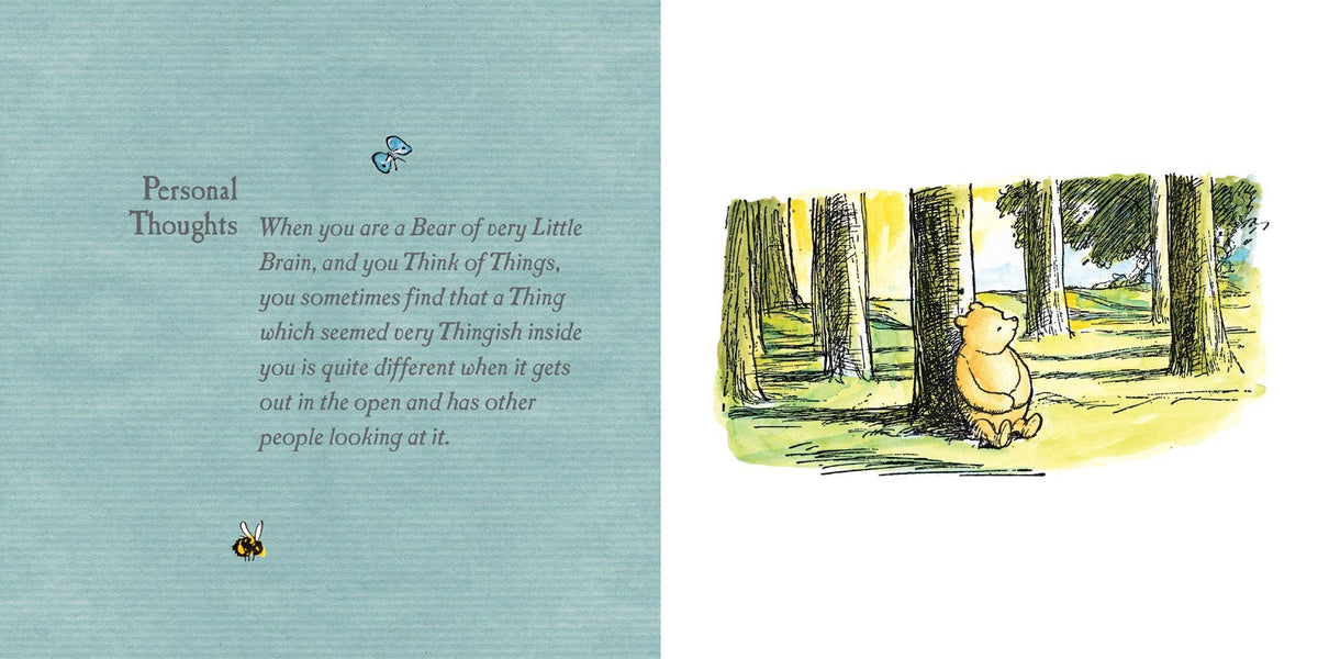 Open pages of Winnie-the-Pooh: The Little Book of Wisdom by A. A. Milne showing illustrated quotations and decorative page designs.