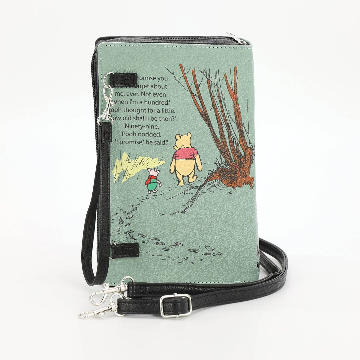 Back of The House at Pooh Corner green book clutch bag showing the illustrated vinyl exterior and book-shaped handbag design.