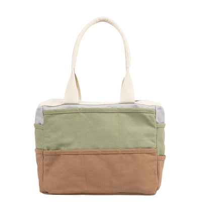 Two-tone green and brown Good Earth Soolla Studio Artist Bag tote bag on a white background
