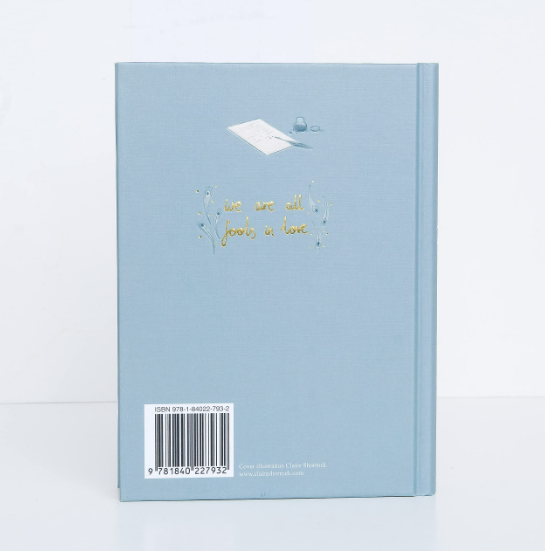 Light blue notebook with text and barcode on a white background