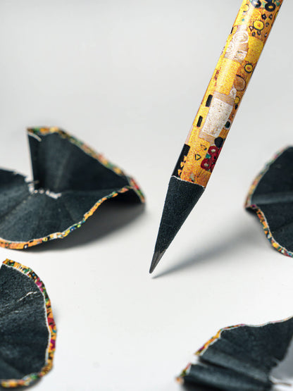 Decorative pencil with colorful design on a white background