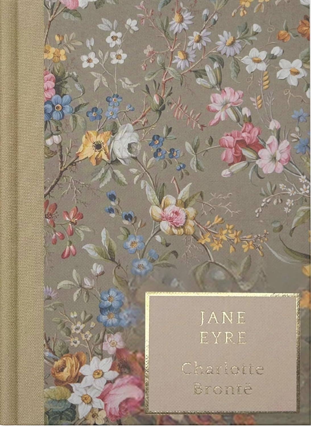 Jane Eyre by Charlotte Brontë, Wordsworth Heritage Collection hardcover with floral cover artwork, textured linen binding, and gold-gilded pages.