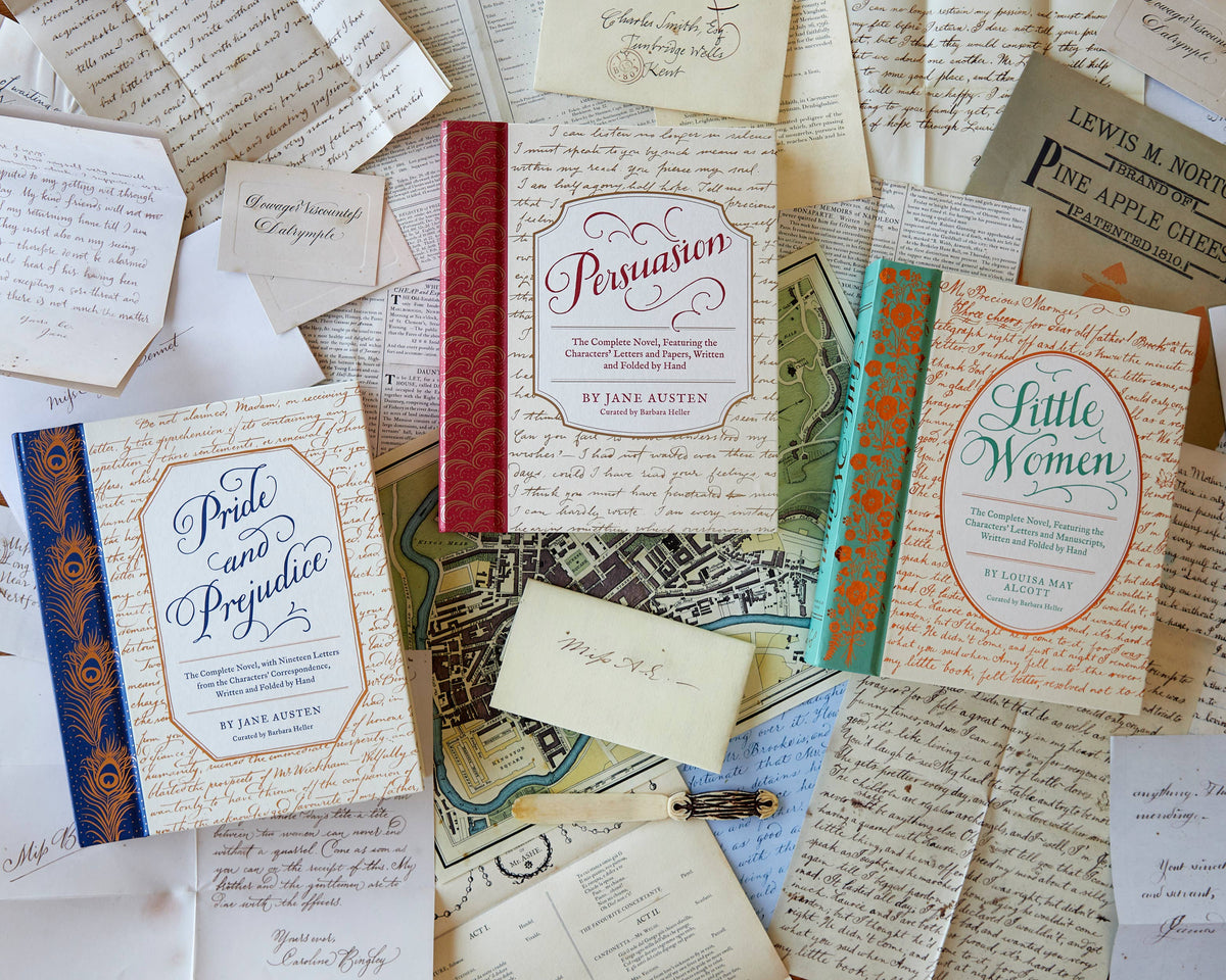 Collection of vintage books and papers with visible titles like &