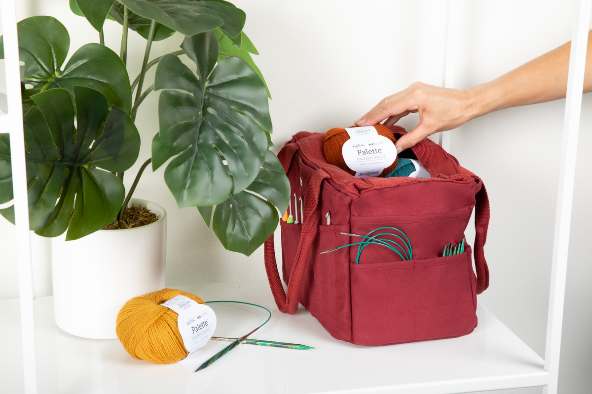 Sangria Soolla Studio Bag holding colorful art and craft supplies.