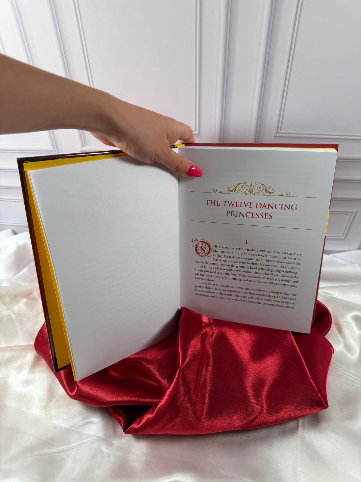 Interior pages of The Red Fairy Book by Andrew Lang showing a traditional fairy tale with decorative typography.