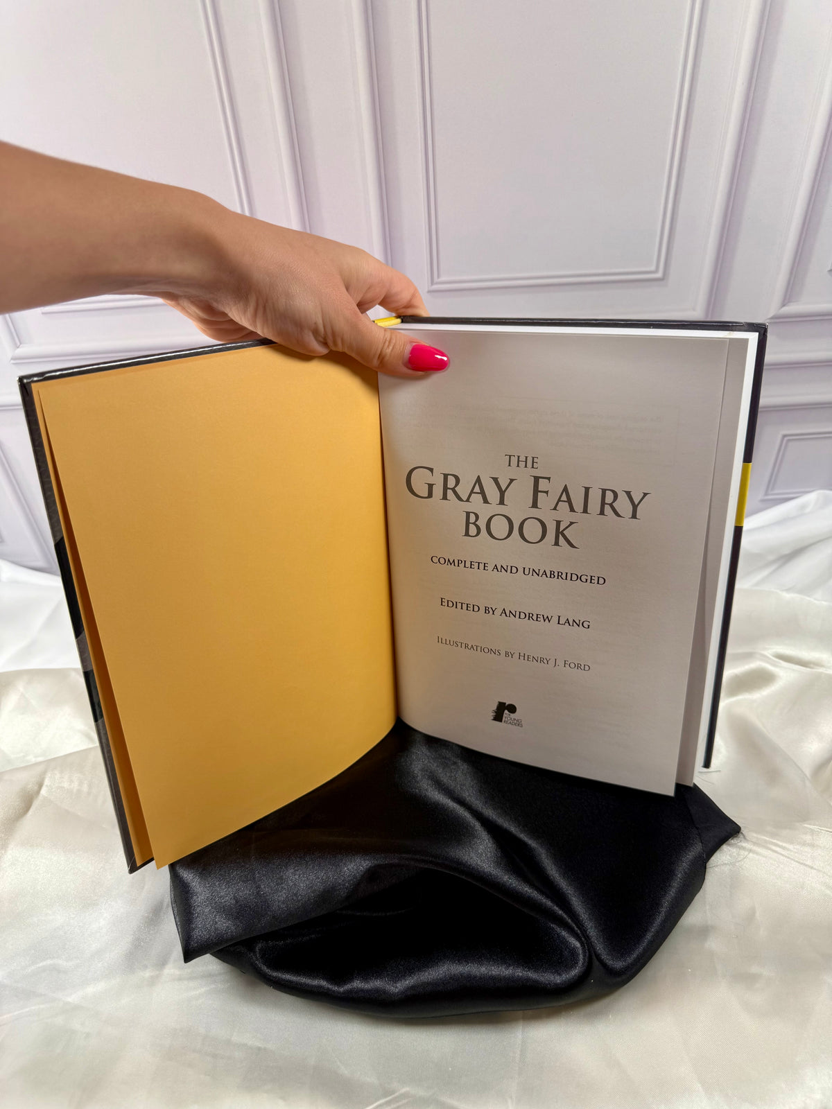 The Gray Fairy Book opened to its title page, showing Andrew Lang&