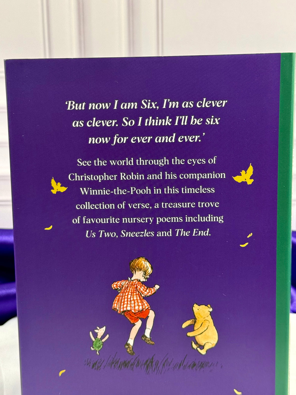 Back cover of Now We Are Six by A. A. Milne, purple hardcover children&