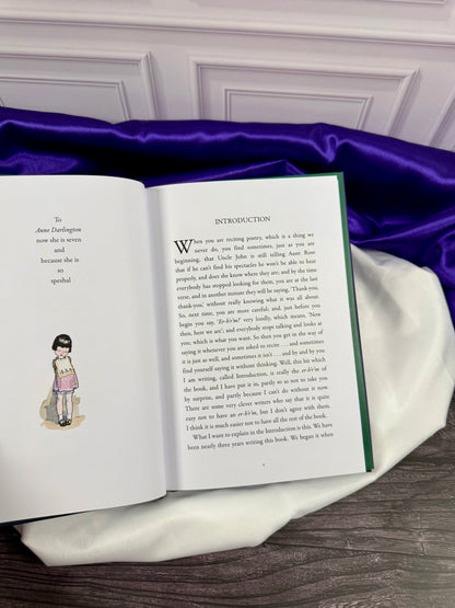 Interior of Now We Are Six by A. A. Milne showing the Introduction opposite the dedication to Anne Darlington and a color illustration by E. H. Shepard.