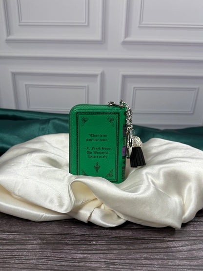 Back of The Wizard of Oz miniature book bag charm featuring the quotation There&