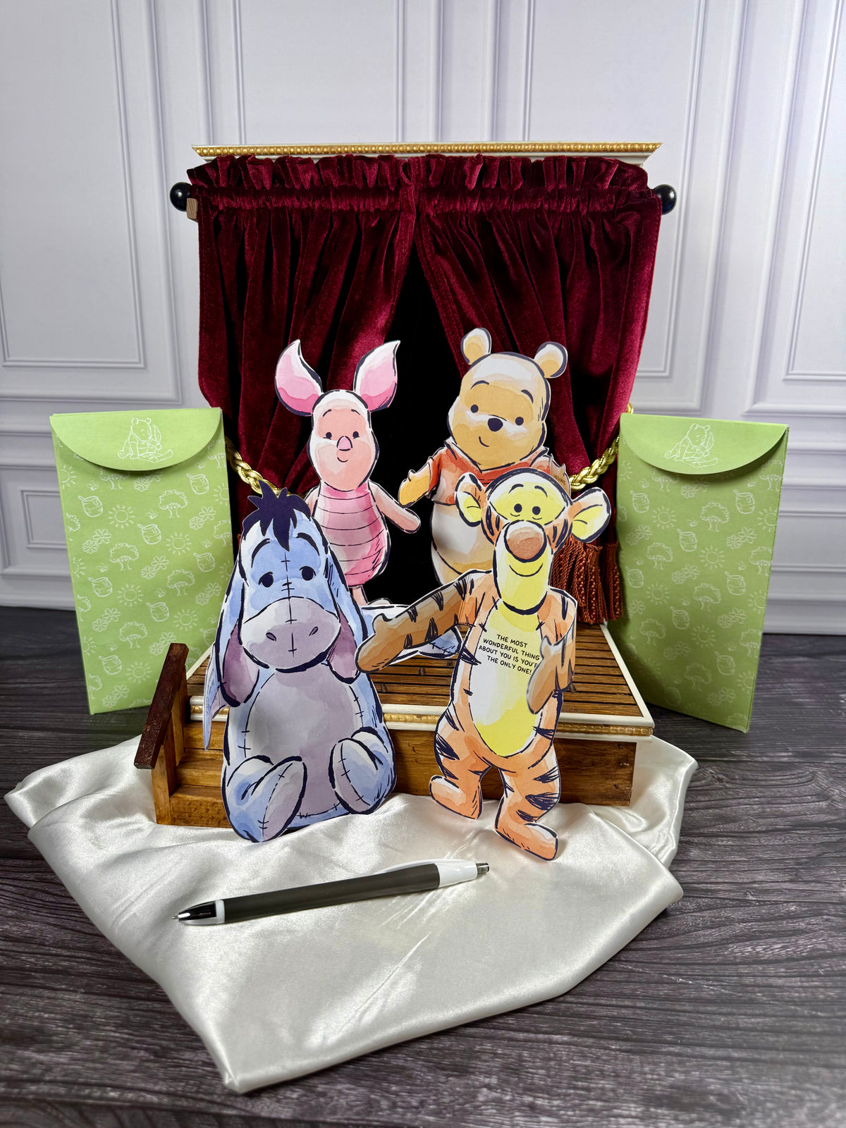 Disney Winnie the Pooh Hugs notecards displayed with Winnie-the-Pooh literary gifts in a StoryGiftStudio bookshop setting.