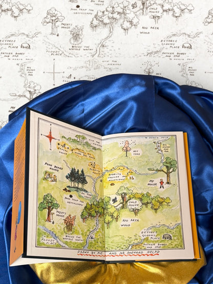 Winnie-the-Pooh hardcover opened to E. H. Shepard&