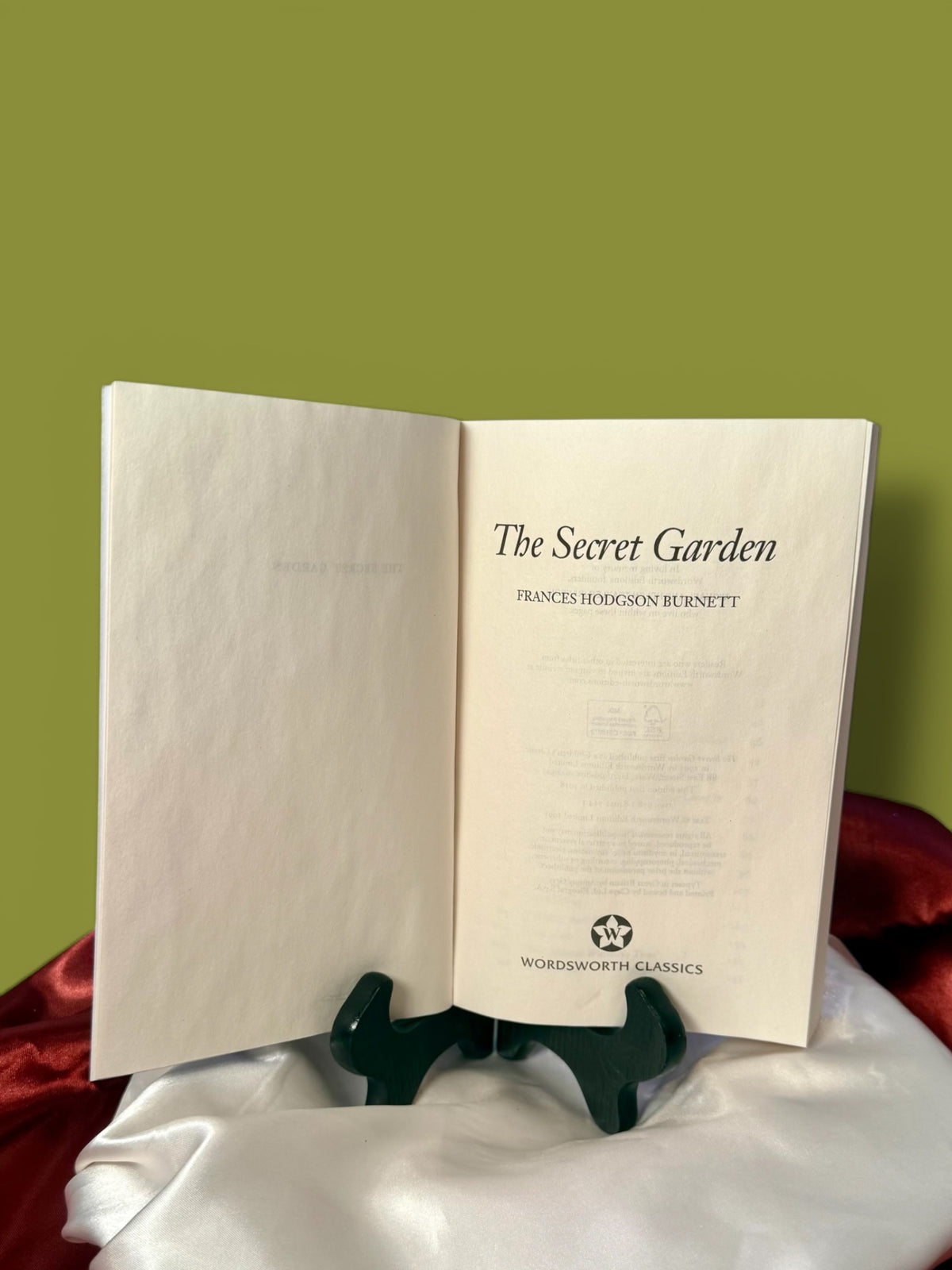 The Secret Garden Wordsworth Classics paperback opened to a title page, showing the book&