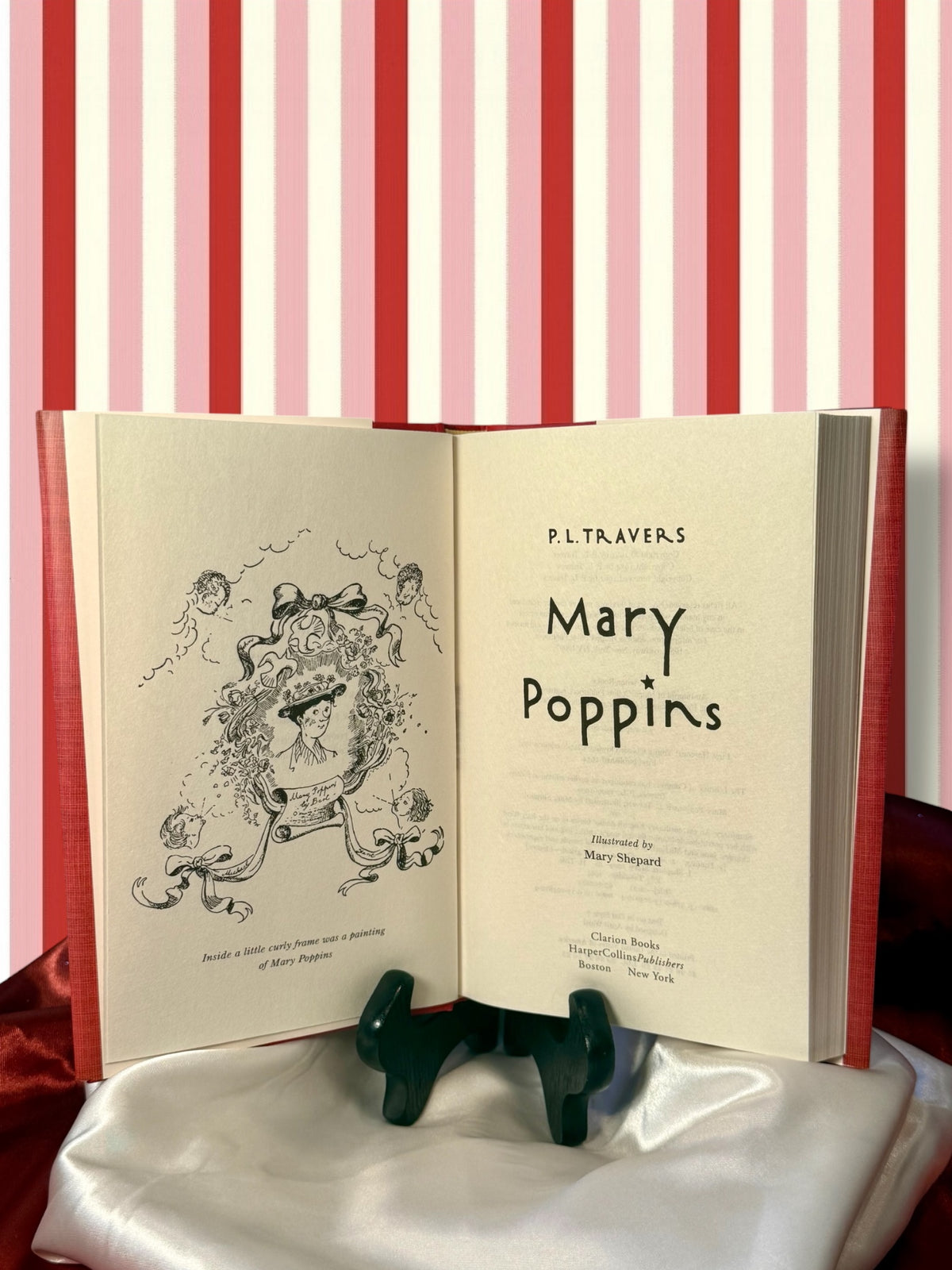 Mary Poppins by P. L. Travers opened to its interior pages, showing the book&