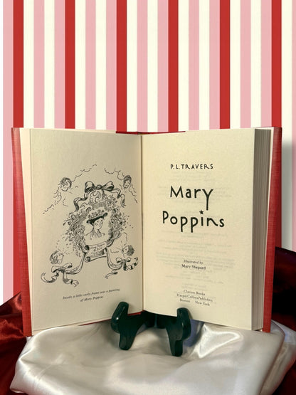 Mary Poppins by P. L. Travers opened to its interior pages, showing the book&