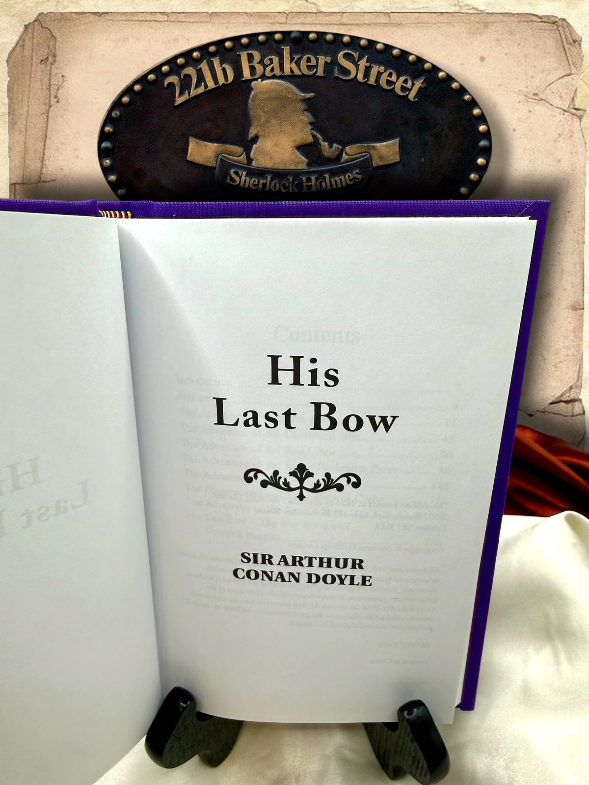 Open copy of His Last Bow showing the interior title page with Sir Arthur Conan Doyle&
