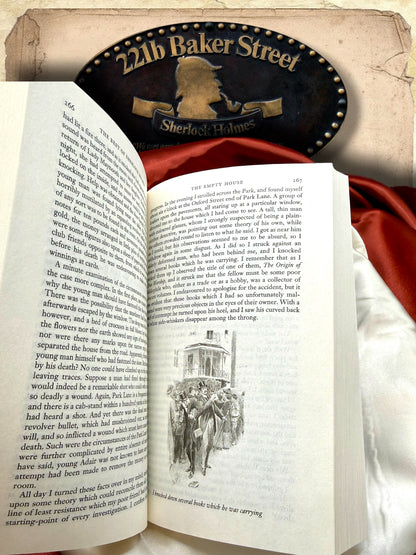 Interior pages of The Best of Sherlock Holmes showing The Empty House with a black-and-white Sherlock Holmes illustration reproduced from The Strand Magazine.