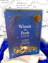 Winnie-the-Pooh: The Complete Collection by A. A. Milne, large blue slipcased hardcover omnibus containing four classic works illustrated by E. H. Shepard, photographed at StoryGiftStudio™.