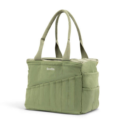 Green tote bag with multiple pockets and a visible brand logo on a white background