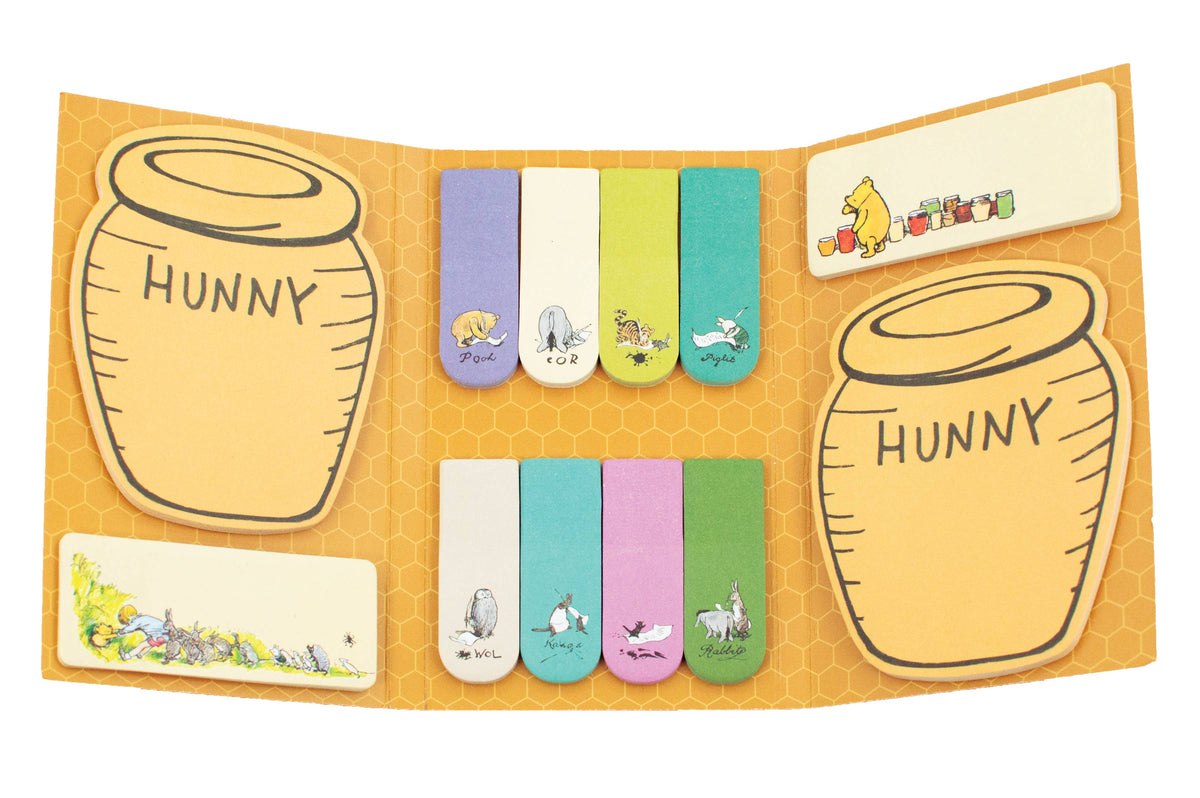 Winnie-the-Pooh Sticky Hunny Notes opened to reveal colorful character page tabs, memo pads, and two Hunny Pot shaped sticky note pads.