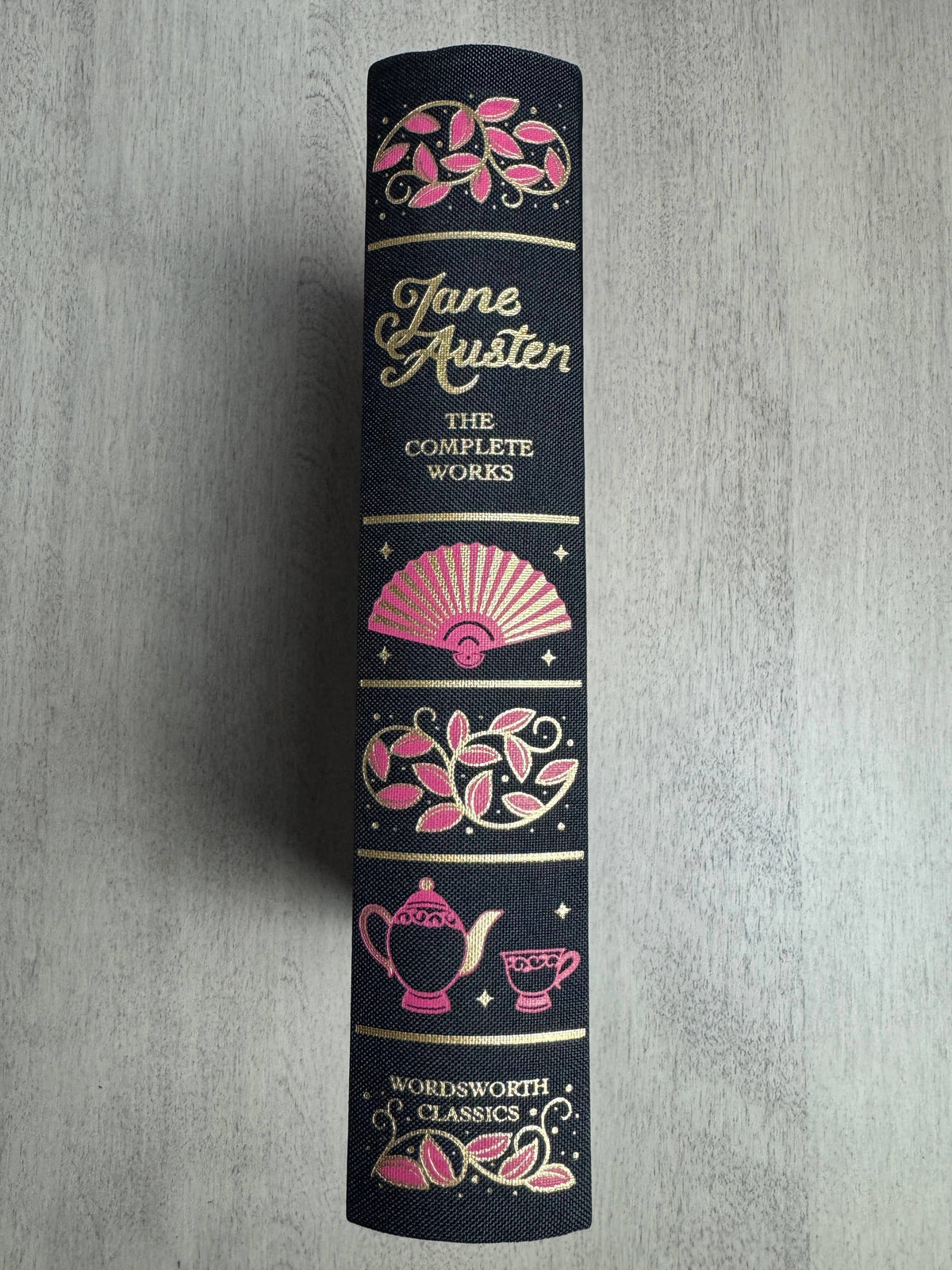Jane Austen book set with decorative cover on a gray background
