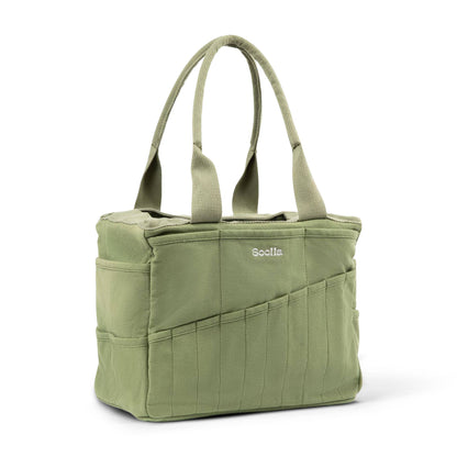 Green tote bag with multiple pockets and a visible brand logo on a white background