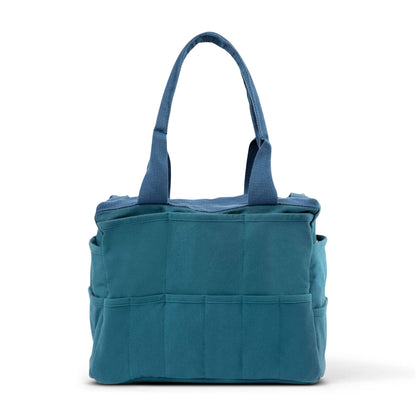 Aquamarine tote bag with multiple pockets on a white background