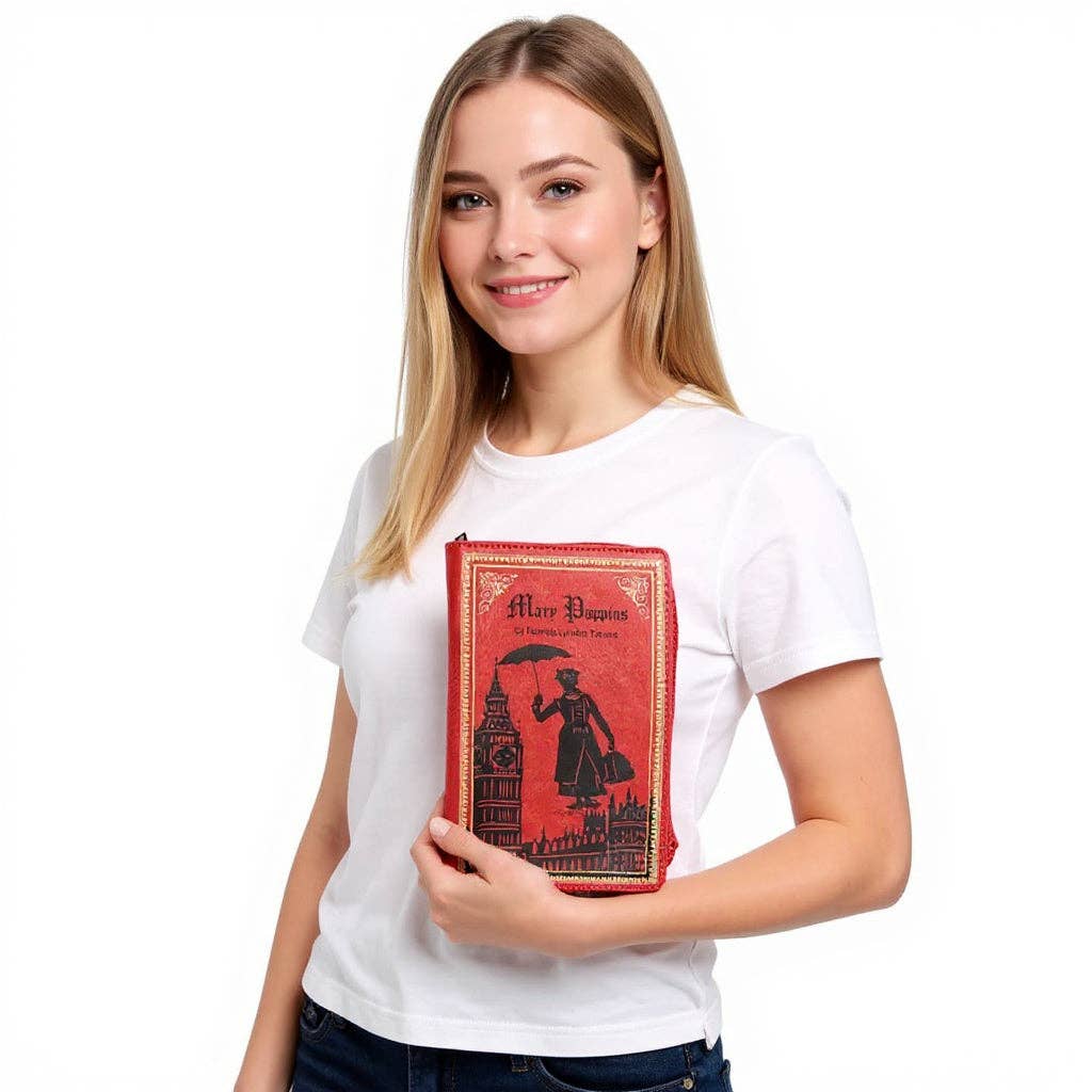 A woman wearing a white t-shirt with a red &