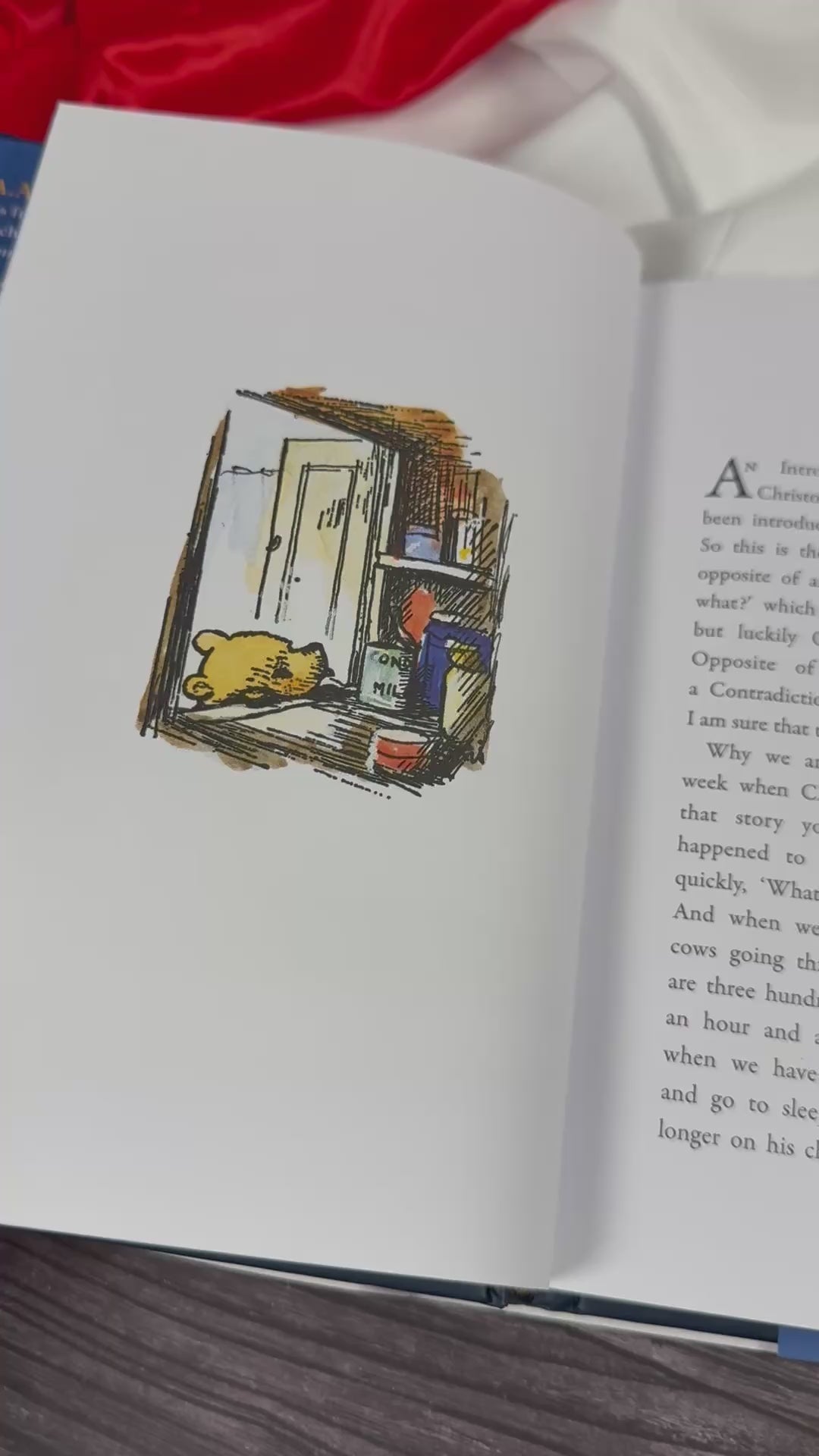 Page-turning video of The House at Pooh Corner by A. A. Milne, showing interior pages and E. H. Shepard illustrations in the anniversary hardcover edition.