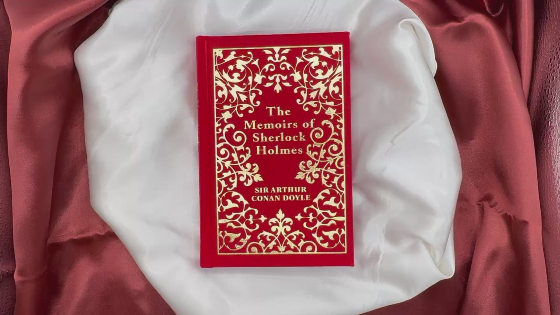 Video showing the books cover and interior pages in a hand for page and size reference.